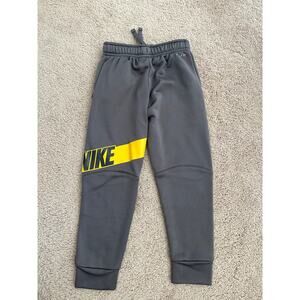 Boys gray/yellow gray dri-fit Nike sweatpants size 6